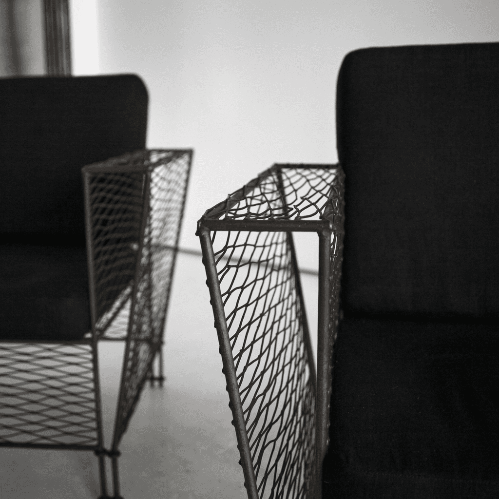 Pair Of French Modernist Metal Upholstered Armchairs